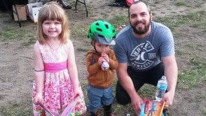 Peace Rally attendee Greg Russell with his children.