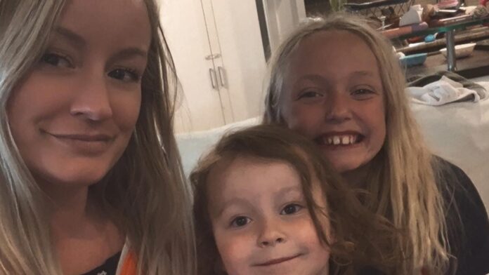 Photo of Bailey McCourt and her two daughters